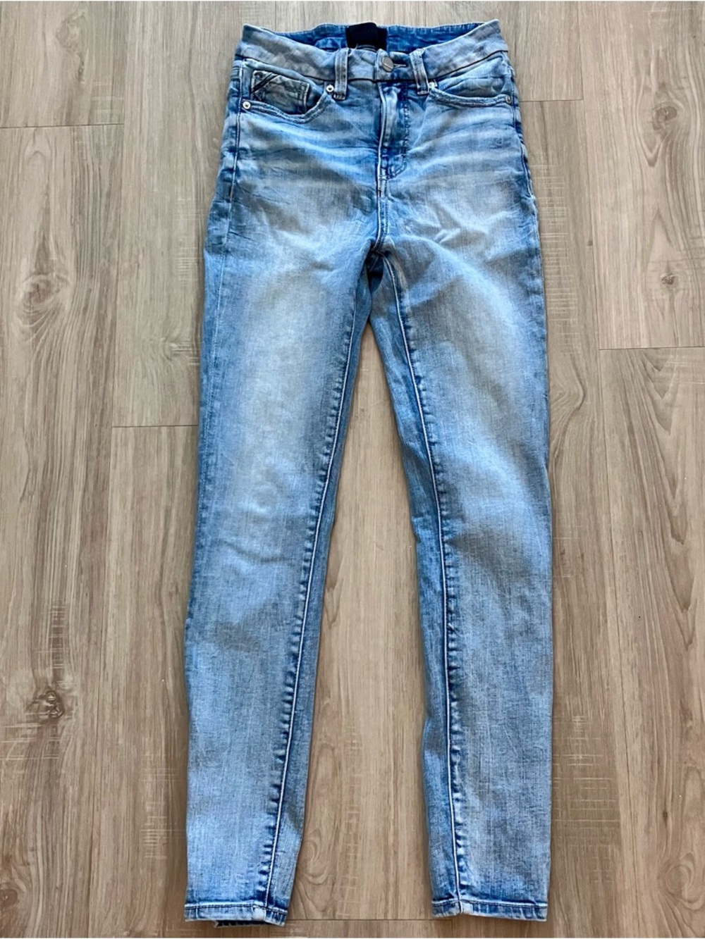 Buckle Black Skinny Ankle Jeans